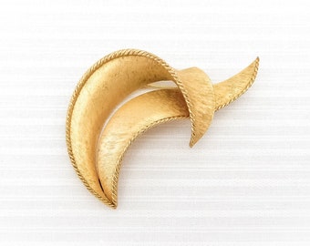 Vintage Gold-Toned Crown Trifari Brooch With Abstract Modernist Shape, Twisted Rope Edges, and Matte Texture | 1960s