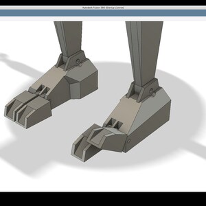 K&ouml;nnte beinhalten: Ein 3D-Modell der F&uuml;&szlig;e eines Roboters mit Gelenken. Die F&uuml;&szlig;e sind aus grauem Material und haben eine strukturierte Oberfl&auml;che.
