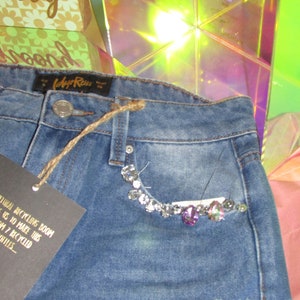 Pantalones cortos con purpurina desgastada y deslumbrada