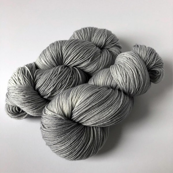 Hand Dyed Sock Yarn - a tonal medium silver gray neutral called "Incoming Rain" - merino blend 85/15 - quantity discounts & caking service