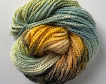Variegated Merino Yarn in Fall Forest shades including mustard yellow, blue-green and brown, Bulky-weight 2-ply wool totaling 109 yards