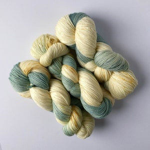 Hand-dyed yarn - speckled blue, green, vanilla - Robin’s Nest color - assigned pooling - lightweight spring and summer yarn