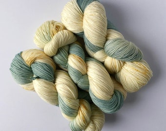 Hand-dyed yarn - speckled blue, green, vanilla - “Robin’s Nest" assigned pooling - free USA shipping - quantity discounts - caking service