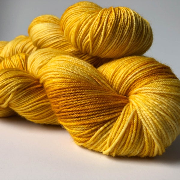 Hand-Dyed sock yarn in "Butterscotch" (mustard yellow) - merino/nylon 85/15 - quantity discounts, caking available
