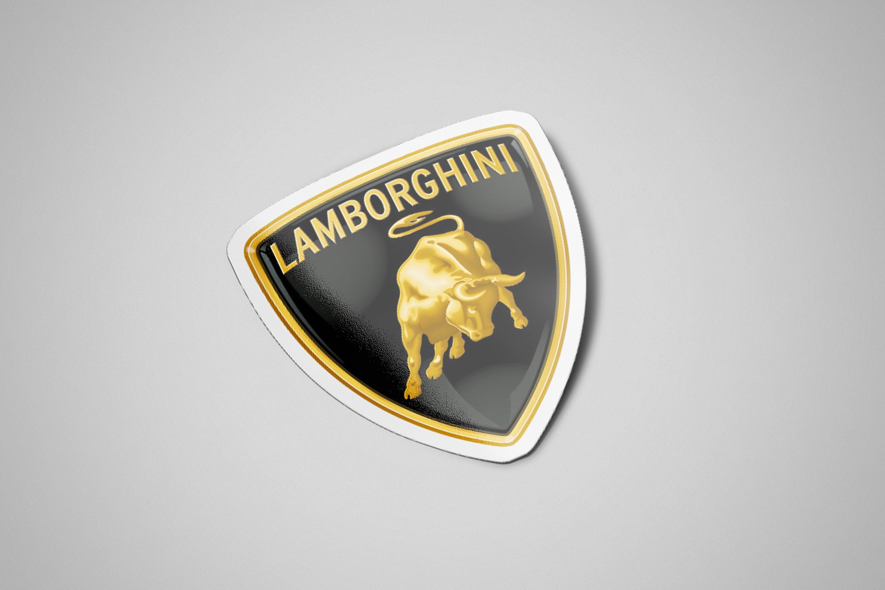 Aufkleber Lamborghini Logo mit Schriftzug auf transparenter Folie Sticker Aufkleber Lamborghini Logo mit Schriftzug auf transparenter Folie Sticker