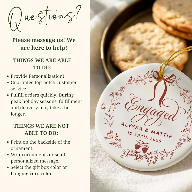 May include: A white ceramic ornament with a maroon floral design and the word "Engaged". The ornament includes the names Alyssa & Mattie and the date 12 April 2026. The ornament is round and has a gold hanging cord.
