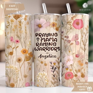 May include: A white tumbler with a floral pattern and the text "Praying + Mama Raising Warriors Angelica".