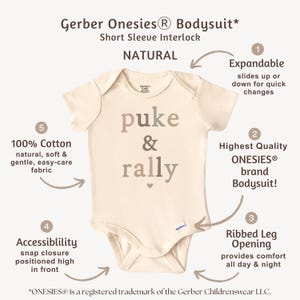 May include: A natural colored short-sleeve onesie with the text "puke & rally" printed on the front. The onesie is made of 100% cotton and has an expandable shoulder opening, ribbed leg opening, and a snap closure in the front.