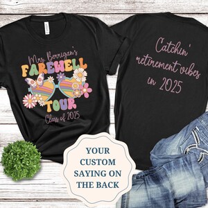 May include: Black t-shirt with a colorful graphic of sunglasses, flowers, and the text "Mrs. Berrigan's Farewell Tour Class of 2025". The back of the shirt has the text "Catchin' retirement vibes in 2025".