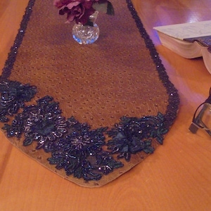 Mylinka Asymmetrical Table Runner Brown Embossed Leather Embellished With Fine Quality Beaded Trim With Organza Flowers