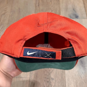 orange nike golf hat