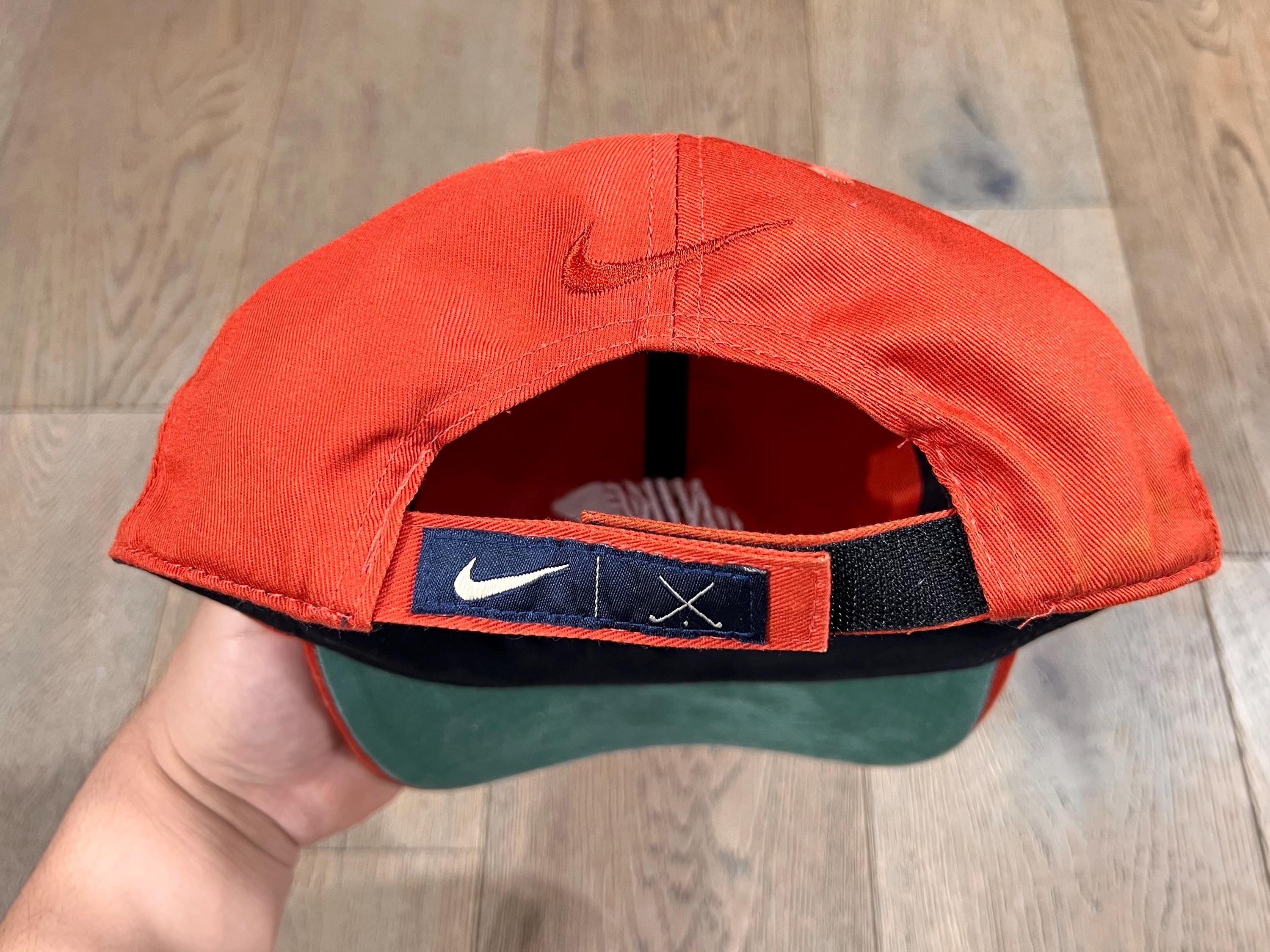 orange and black nike hat
