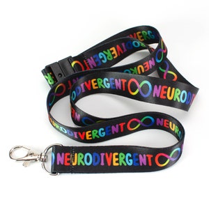 May include: Black lanyard with a rainbow infinity symbol and the text "Neurodivergent" repeated on both sides.