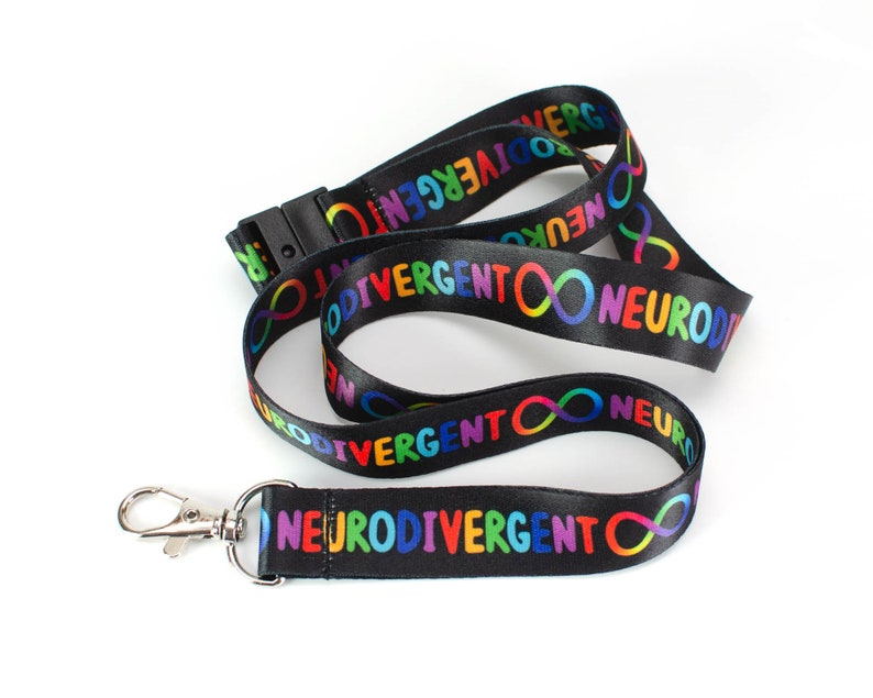 May include: Black lanyard with a rainbow infinity symbol and the text "Neurodivergent" repeated on both sides.