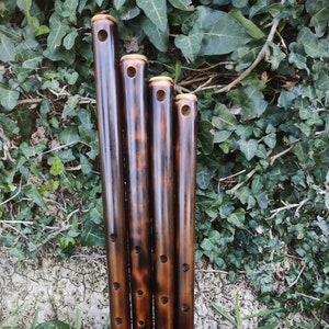 Oriental Flute in various keys tuned with a minor pentatonic flute. Handmade ethnic bamboo flute with oriental scale and burned look
