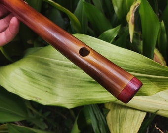 A Minor harmonic Bamboo Flute. Rustic handmade flute. Ethnic flute in A harmonic minor.