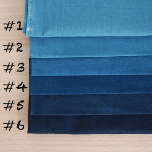 May include: Six swatches of fabric in shades of blue, from light to dark, labeled #1 through #6.