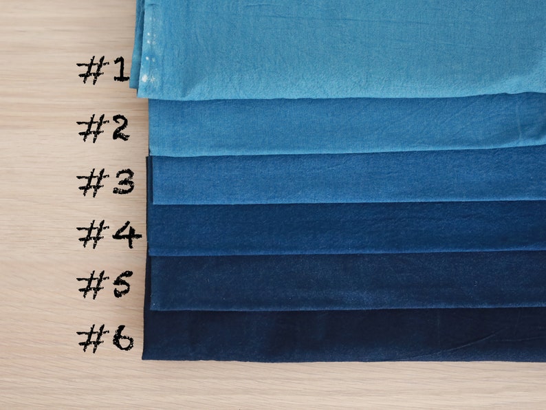 May include: Six swatches of fabric in shades of blue, from light to dark, labeled #1 through #6.