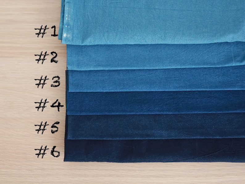 May include: Six swatches of fabric in shades of blue, from light to dark, labeled #1 through #6.