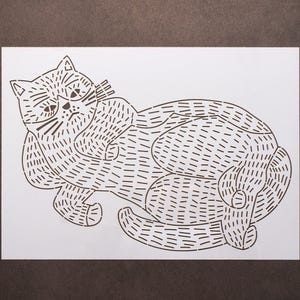 May include: A black and white line drawing of a cat lying on its side. The cat is drawn with a series of short, parallel lines that create a textured effect.