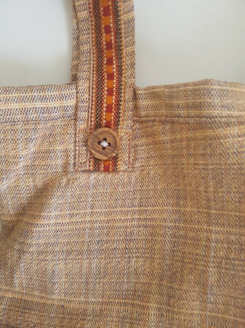 Khadi cotton shoulder bag with tribal details Handwoven bag