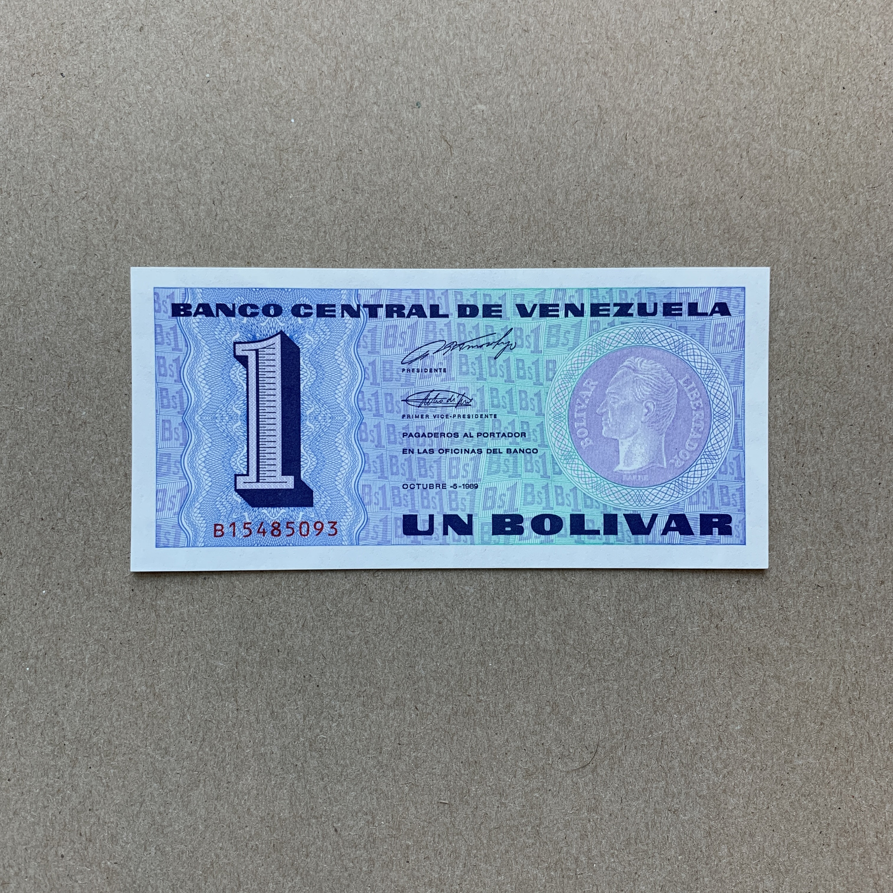 Tiny 1989 Venezuelan 1 Bolivar Note. Coin head of Simon Bolivar at right. World Banknote, World Currency. Vintage Memorabilia. Mint