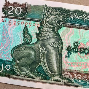 Chinze Papiergeld. Myanmar 20 Kyats Banknote. Steinlöwe chinesische Statue im Tempel. Eine mittelalterliche Statue Währung Note. Memorabilia Bill.