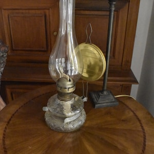 Oil lamp, decorative - carved glass base with brass stand and glass  chimney with burner. 1940s . Height 36 cm. 14.1&quot;