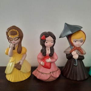 12 Ceramic figurines. Hand made and hand painted. 12 girl figurines , each one depicting one month of the year. OOAK. 1980s.