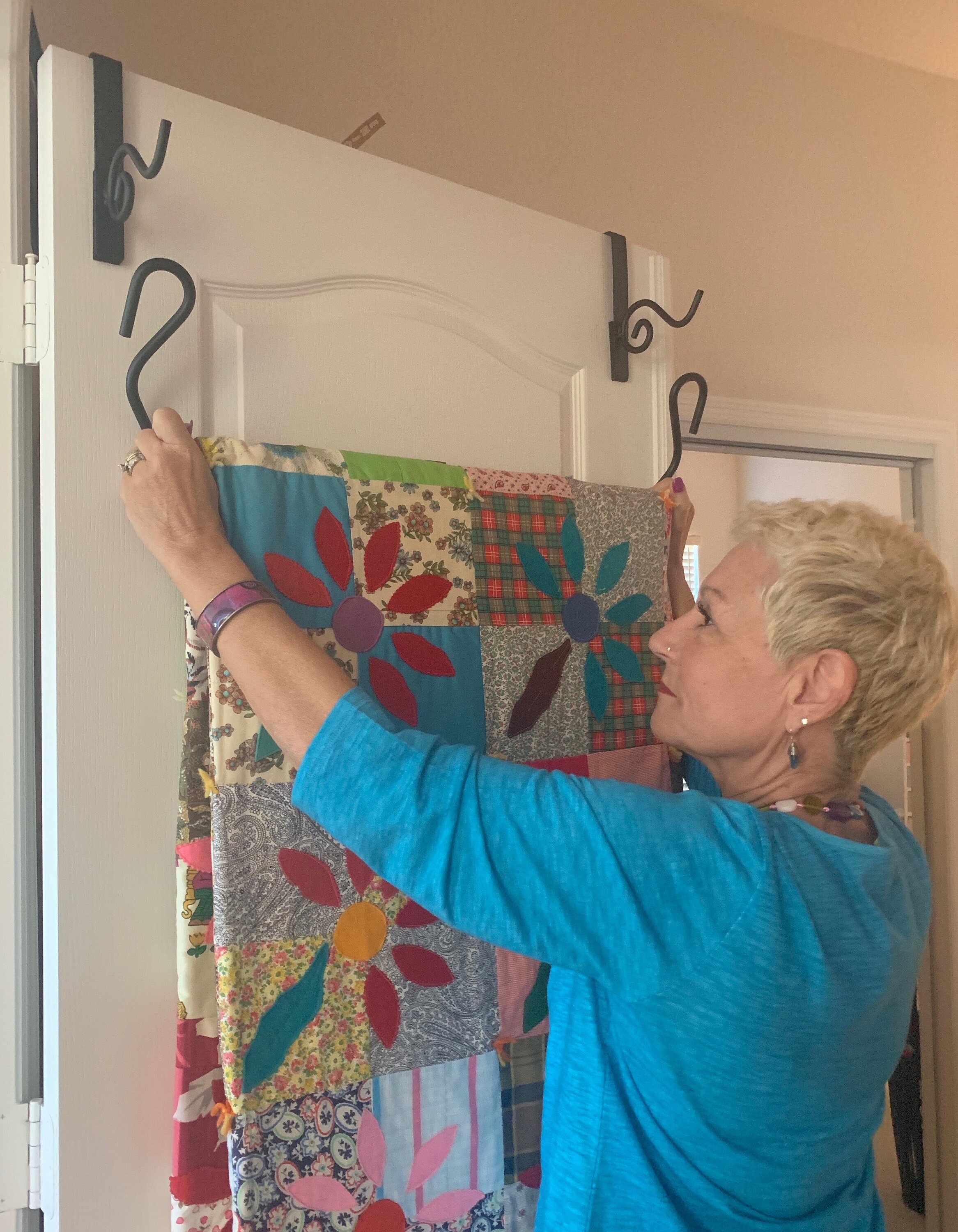 Over door storage for bedding/quilts. Holds up to King Etsy