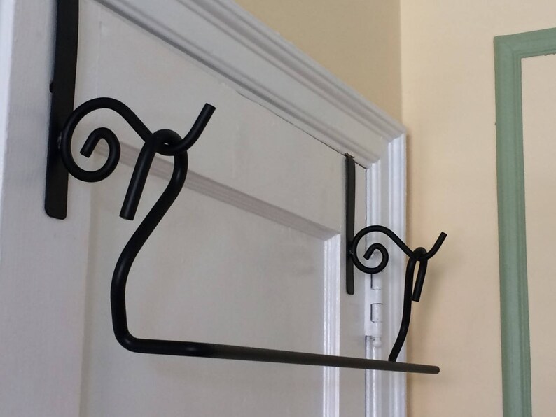 Over door storage for bedding/quilts. Holds up to King Etsy