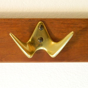 Auböck wooden hook rail with three brass hooks