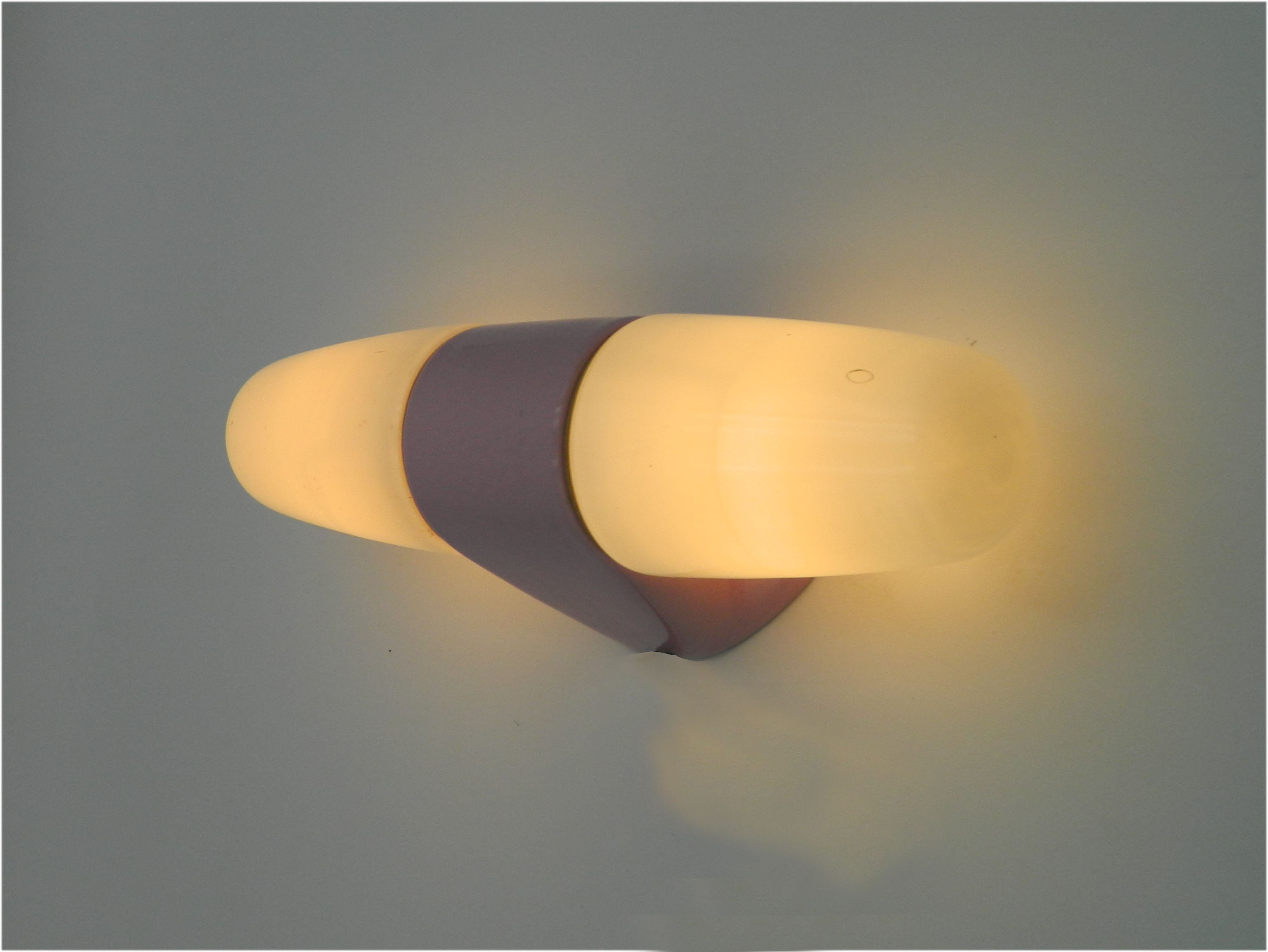 Pink mirror lamp or wall lamp model 6068 designed by Wilhelm Wagenfeld for Lindner Germany