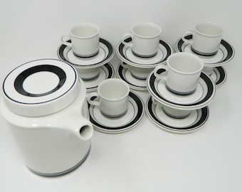 Arabia Finland Decor Faenza black coffee can and nine demitasse with saucer designed by Peter Winquist