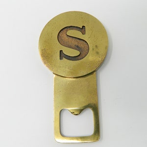 Auböck bottle opener “S” made of brass