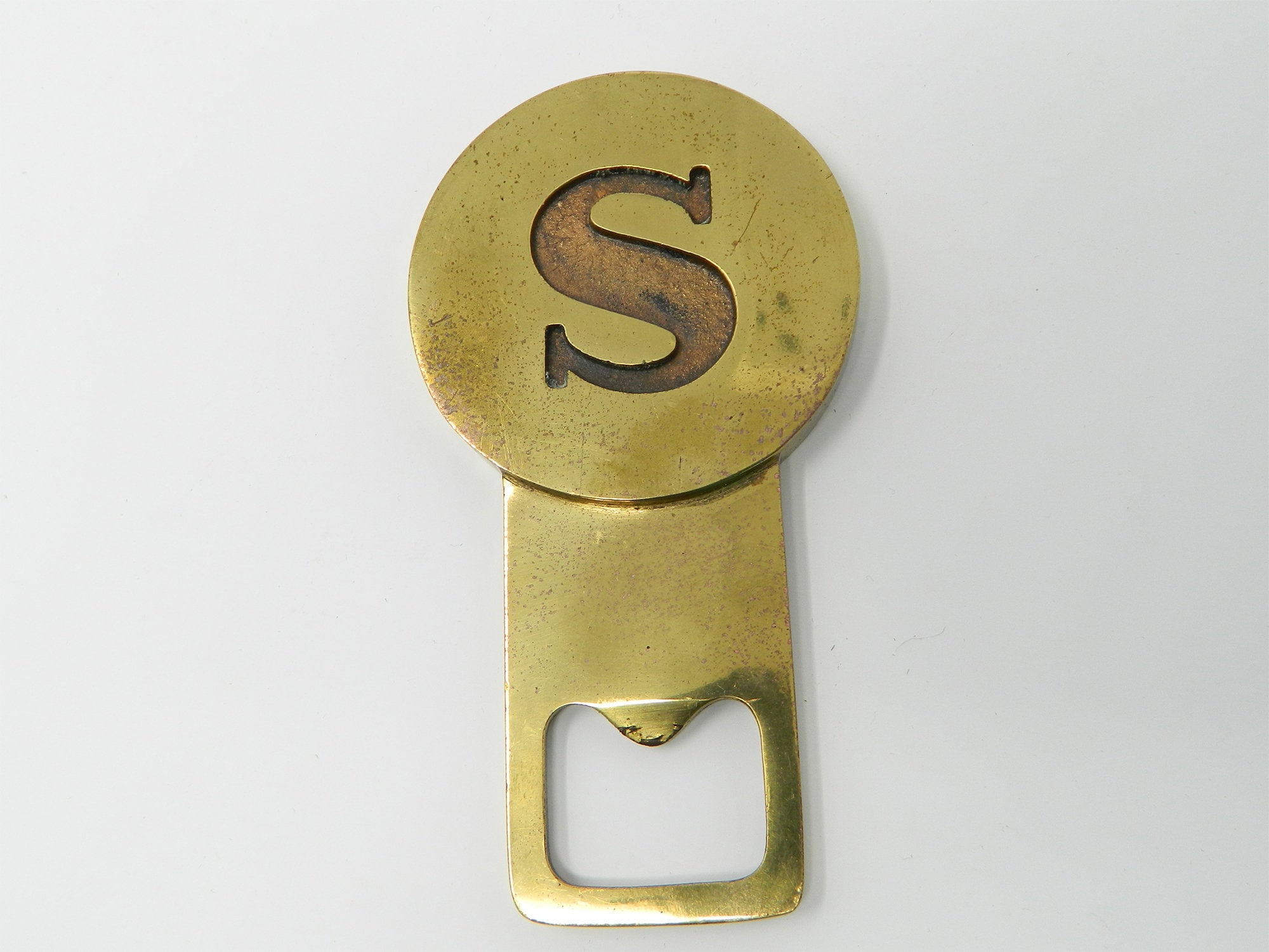 Auböck flesopener van messing “S”