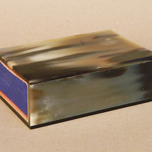 horn match box cover by Carl Aubock