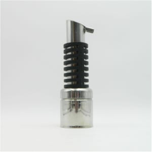 May include: A stainless steel oil pourer spout featuring a cylindrical base and a top section with a black silicone ribbed grip. The metal spout is angled at the top for controlled pouring, and the overall design is sleek, metallic, and functional.