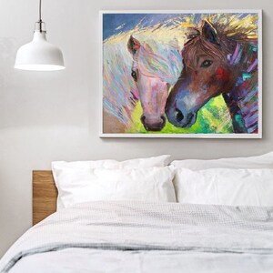 May include: A painting of two horses, one white with a pink mane and the other brown with a purple mane, looking at each other. The background is a colorful abstract design.