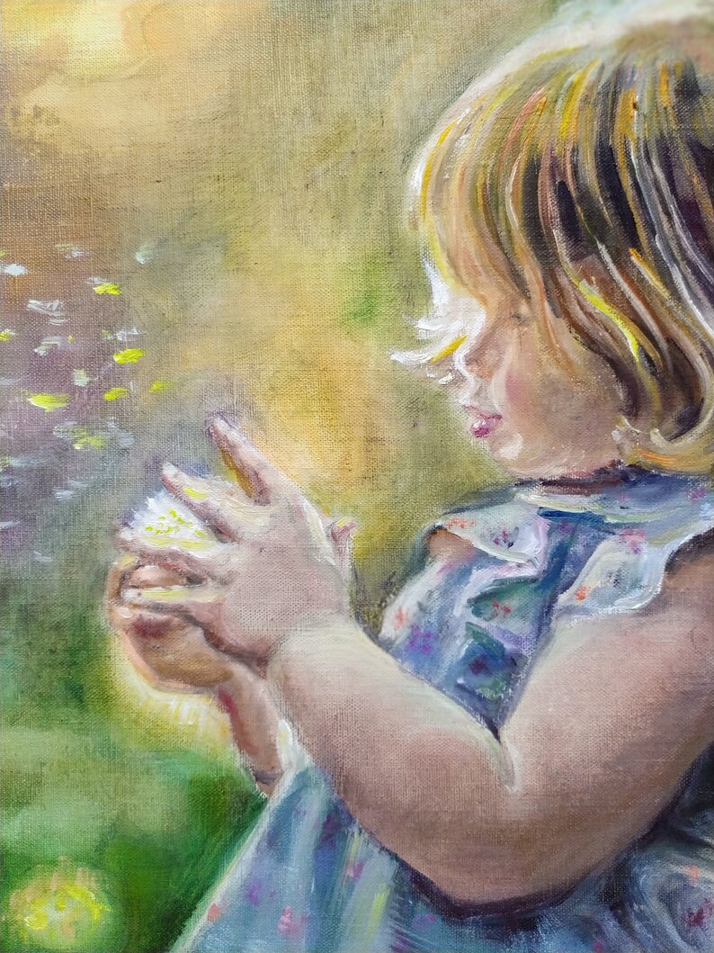 May include: Oil painting of a young child with blonde hair, wearing a blue floral dress. The child is holding a fluffy, yellow object, possibly a flower, against a soft, blurred backdrop of green and yellow.