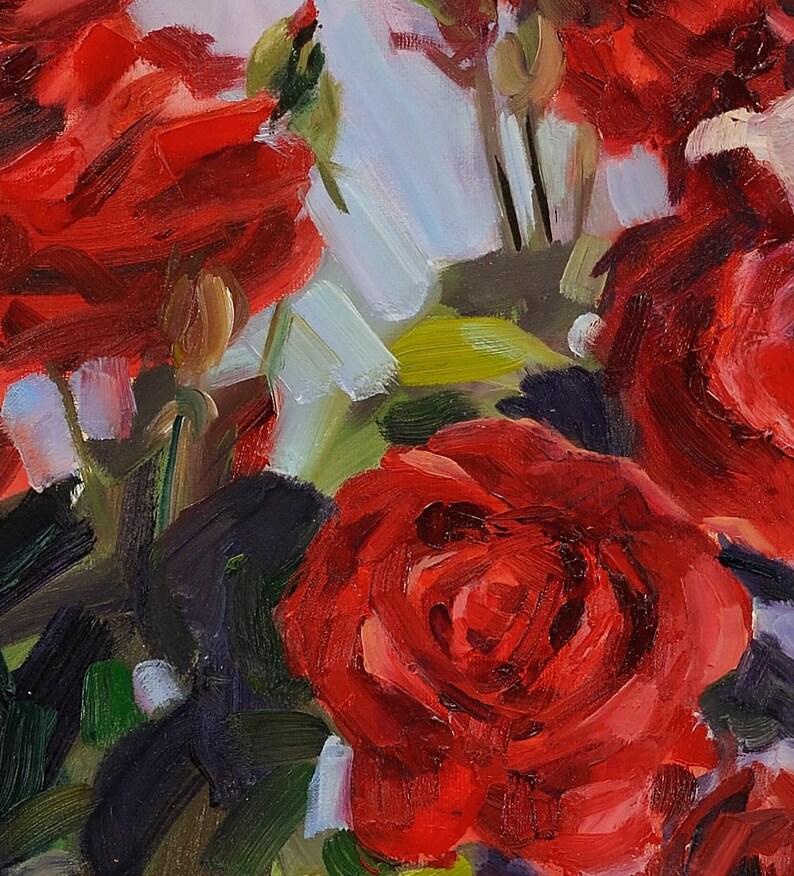 May include: Close-up of a vibrant oil painting featuring several red roses in full bloom. The petals display rich shades of red, with hints of white and green foliage. The artwork has visible brushstrokes, creating a textured and dynamic floral arrangement.