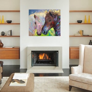 May include: A painting of two horses' heads, one white and one brown, with their noses touching. The background is a colorful abstract design.