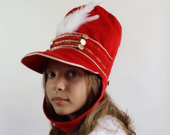 Nutcracker hat in red velvet, white feather, satin lining