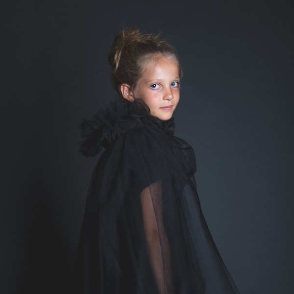 Black tulle cape, taffeta bow