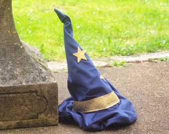 Merlin's hat in blue velvet, gold braid and stars, ivory satin lining