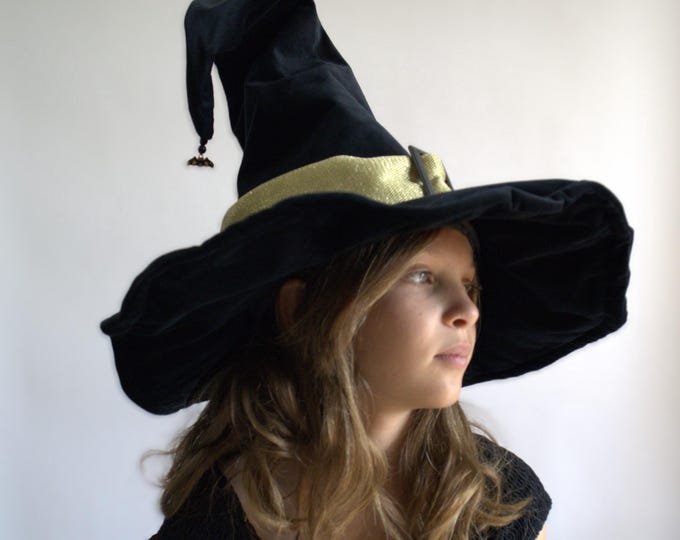 Black velvet witch hat, wide brim, ivory satin lining