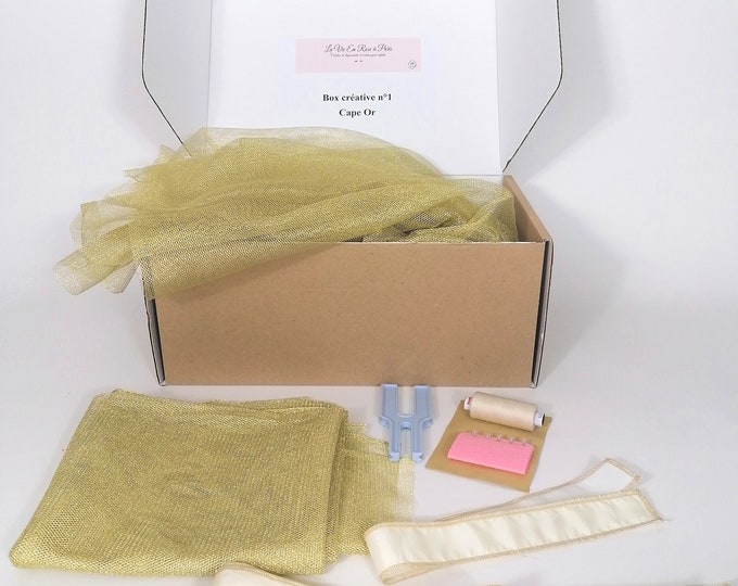 BOX CREATIVE: tulle cape and decorative pompoms