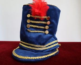 Nutcracker hat in blue velvet and red feathers, ivory satin lining