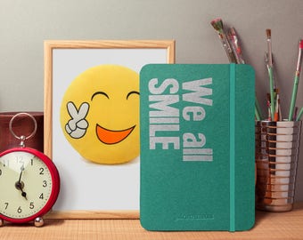 We all SMILE in the SAME language - 100 Page Notebook with quote - Perfect Gift - iPad Mini Size - Fountain Pen Friendly