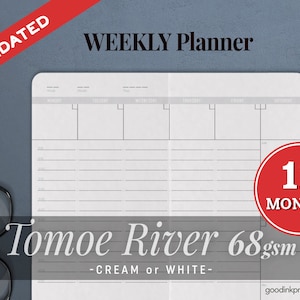 May include: Undated weekly planner with 12 months, featuring a white Tomoe River 68gsm paper, cream or white, with a grey background.